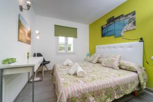 En eller flere senge i et værelse på La vista del angel + 32 billeder