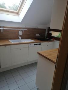 A kitchen or kitchenette at Appartement Moni / Golf & Ski - TOP 9