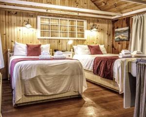 Katil atau katil-katil dalam bilik di Cottage 3 - Pet Friendly - 1 Bedroom / 1 Bath