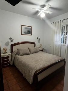 Postel nebo postele na pokoji v ubytování Poniente