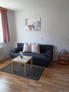 Ferienwohnung Wolf的休息区