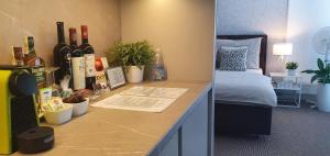 Nápoje v ubytování Apartment Holata 201