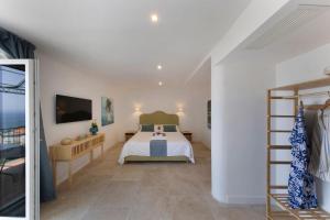 Postel nebo postele na pokoji v ubytování Villa Mundis Relais