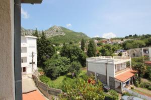 a view from the balcony of a building at Magnolia rooms and apartments in Sutomore