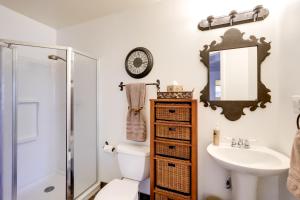 a bathroom with a sink toilet and a mirror at Williams Cottage with Patios and Grill Near Route 66 in Williams +25 photos