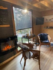 Posezení v ubytování Le chalet de l’Onde