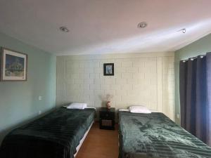 Un pat sau paturi într-o cameră la Casa Camacho