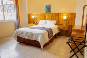 Postelja oz. postelje v sobi nastanitve Hotel Guacamaya