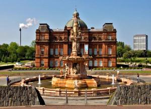 a large building with a fountain in front of it at Fab Location 1 bed Apt overlooking Glasgow Green in Glasgow