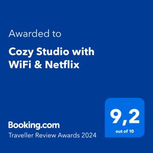 a screenshot of a cell phone with the text awarded to cozy studio with wifi at Cozy Studio with WiFi & Netflix in Playa del Carmen