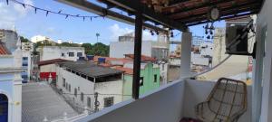 a view of a city from a balcony at Pousada Zumbi dos Palmares in Salvador