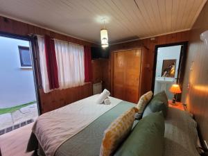 Cama ou camas em um quarto em Hotel El Coihue