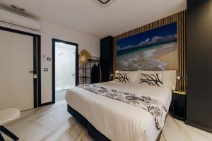 Ein Bett oder Betten in einem Zimmer der Unterkunft HOSTAL LUXURY NIT I DIA
