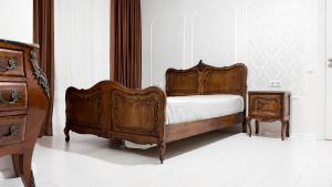 Un pat sau paturi într-o cameră la Rent&live apartment classic