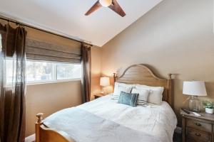 a bedroom with a large bed and a window at High Sierra Haven in Incline Village