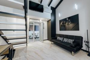 Ein Sitzbereich in der Unterkunft HOSTAL LUXURY NIT I DIA