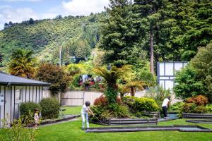 a group of people working in a garden at Ripple Rotorua in Rotorua
