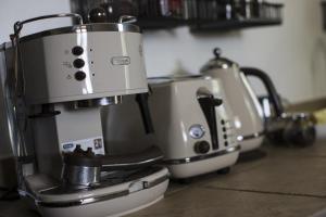 Príslušenstvo na prípravu kávy alebo čaju v ubytovaní B&B Cà Biocco