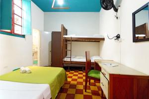 Letto o letti in una camera di Ding-Dong Hostel