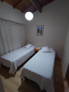 Postel nebo postele na pokoji v ubytování La Laguna - Casa familiar a 5 cuadras de la playa.