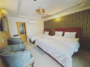 Postel nebo postele na pokoji v ubytování swat view hotel