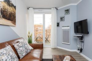 Seating area sa Appartement confortable Proche de Paris - Balcon - Parking & Wifi