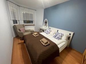 En eller flere senge i et værelse på Willa ,,Sand Garden" - Osiedle Bałtyk - Grzybowo