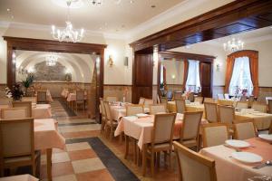 Reštaurácia alebo iné gastronomické zariadenie v ubytovaní Zameczek