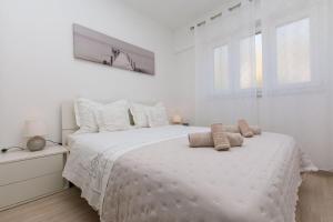 Ένα ή περισσότερα κρεβάτια σε δωμάτιο στο Apartment Miranda