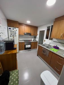 O bucătărie sau chicinetă la Habitación Doble Con Baño Privado