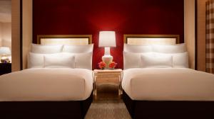 Postel nebo postele na pokoji v ubytování Encore at Wynn Las Vegas