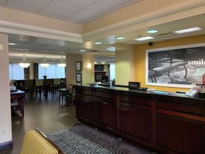 a waiting area of a salon with a waiting room at Hampton Inn Danville in Danville