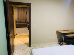 Postel nebo postele na pokoji v ubytování La Casita