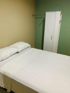 Postel nebo postele na pokoji v ubytování La Casita