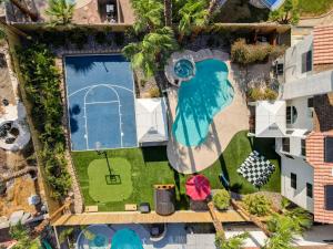 an overhead view of a swimming pool and a yard at Buddha Play Modern with Pool & Spa Sauna Near Vegas strip in Las Vegas