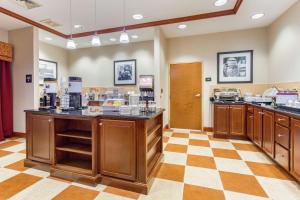 a large room with a checkerboard floor at Hampton Inn Auburn in Auburn