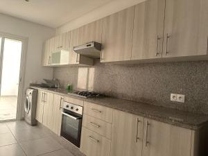 Kuchyň nebo kuchyňský kout v ubytování Residence Neya Harhoura