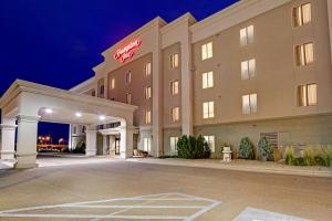 a rendering of a hotel at night at Hampton Inn - Great Falls in Great Falls