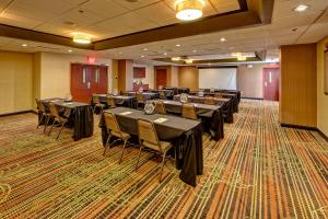 a conference room with tables and chairs in it at Hampton Inn Indianapolis-SW-Plainfield in Plainfield