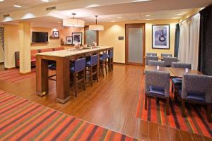 a conference room with a long table and chairs at Hampton Inn Joliet/I-80 in Joliet