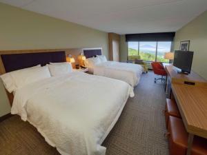 Voodi või voodid majutusasutuse Hampton Inn Hazleton toas