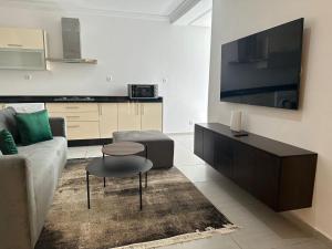TV a/nebo společenská místnost v ubytování Residence Neya Harhoura