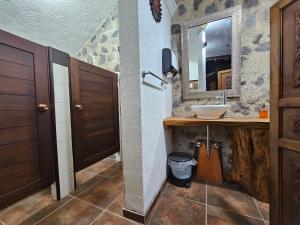 a bathroom with a sink and a mirror at La Capitanía in Antigua Guatemala +187 photos