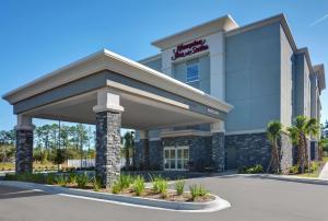 a rendering of the front of a hotel at Hampton Inn And Suites Macclenny I-10 in Macclenny