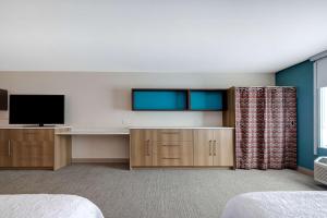 TV a/nebo společenská místnost v ubytování Home2 Suites By Hilton Bryant, Ar