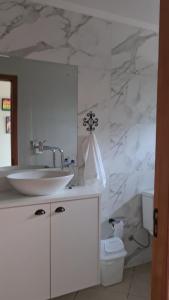 Ванна кімната в Quarto Luz