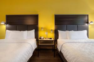 Tru By Hilton Galveston, Tx客房内的一张或多张床位