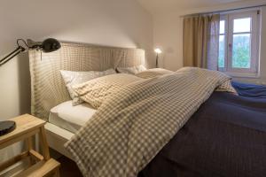 Katil atau katil-katil dalam bilik di Herthaquelle Wohnung 4 "Schöne Aussicht"