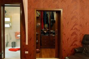 a room with a closet and a glass door at Luxury Villa in Rehab City in Cairo