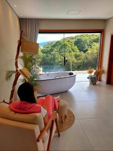 Gambar di galeri bagi Casa Espetacular com banheiras e uma vista incrível. di Tiradentes